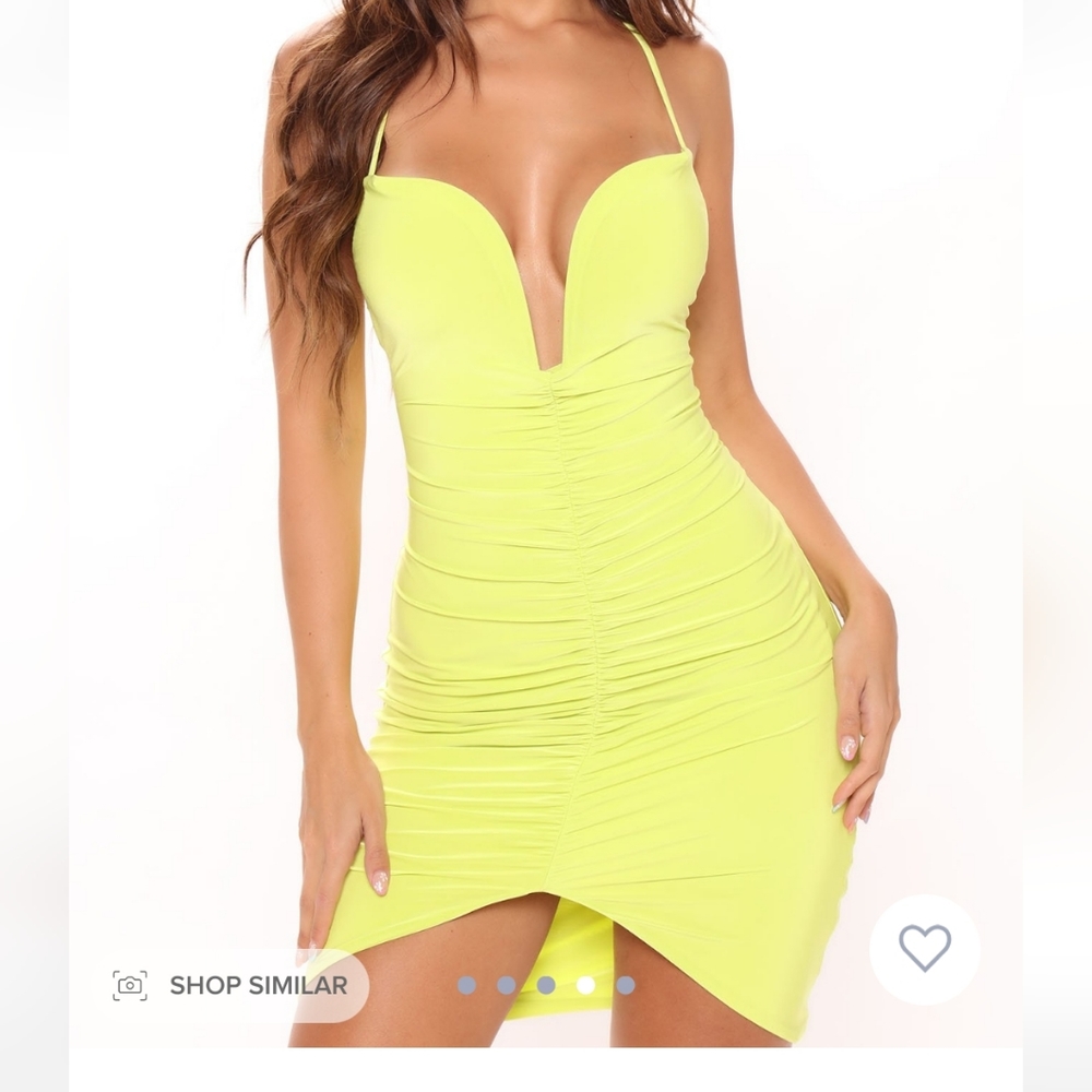 Lime color dress.